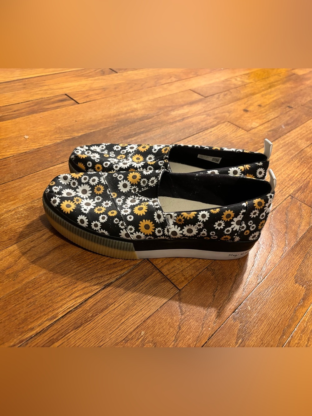 Toms Black Canvas Slip-Ons with Yellow & White Daisy Print